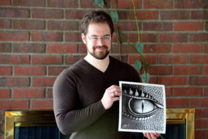 Christopher Paolini holding his print of Saphira's Eye.