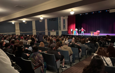 Murtagh Naperville 2023, fans watch as Christopher Paolini prepares to come on stage for an event hosted by Anderson Books at North Central College in November 2023